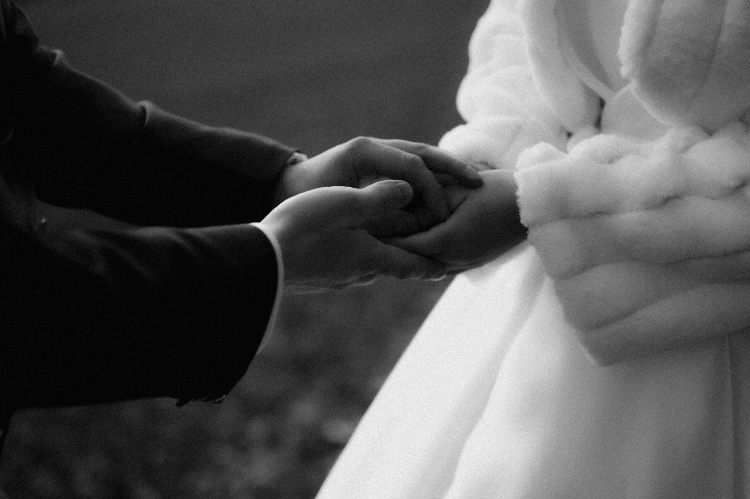 Groom holding bride's hands during wedding in stuttgart