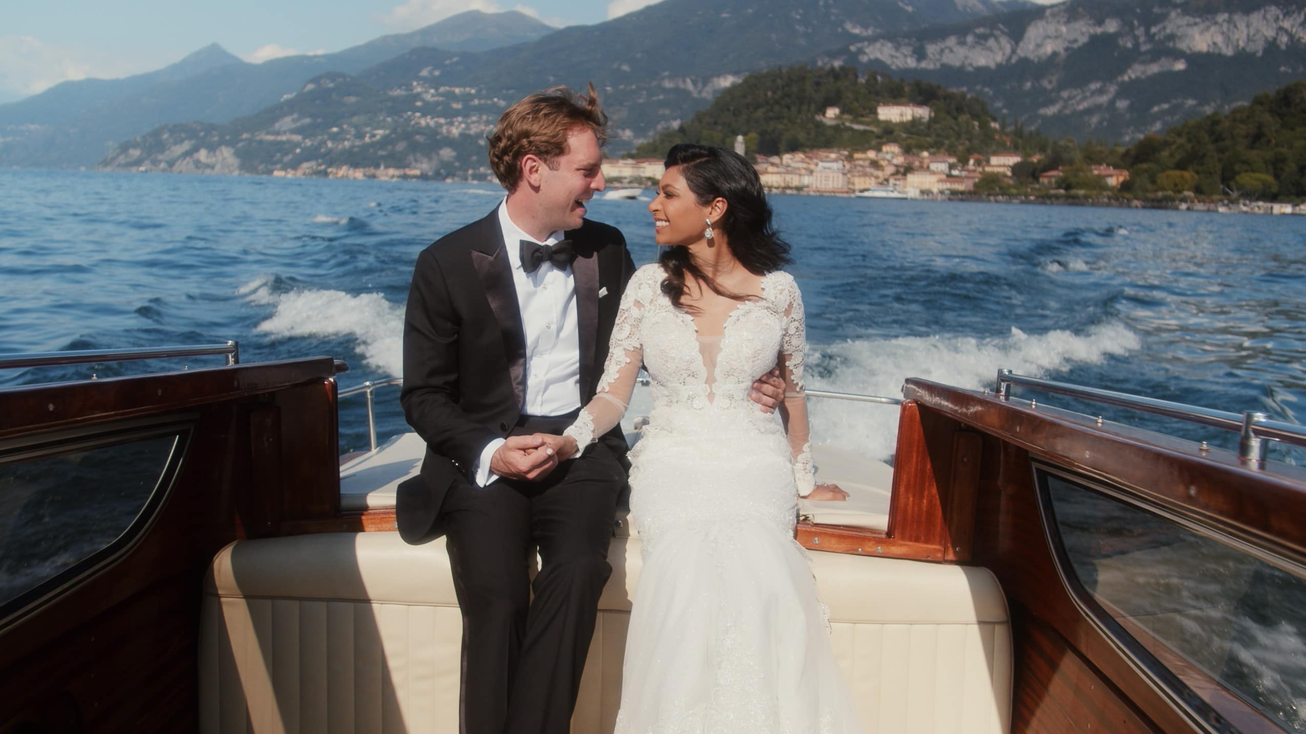 Bride and groom enjoying a boat tour in Lake Como during Villa del Balbianello Wedding
