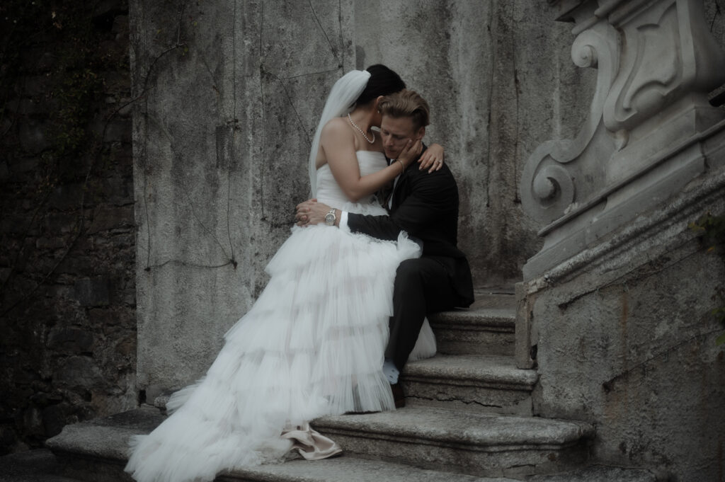 bride and groom hugging in villa Carlotta during Lake Como elopement