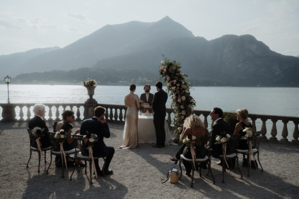 ceremony of bride and groom and guests at villa serbelloni micro wedding