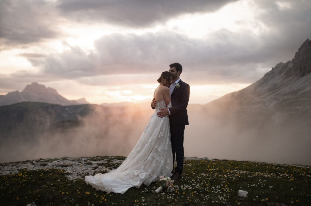 Experience the magic of Samantha & David's sunset Dolomites elopement. Amidst the towering peaks and breathtaking vistas, their love story unfolds in a series of stunning images. Join us as we journey through the beauty and romance of their intimate celebration in the heart of the Italian Alps.
